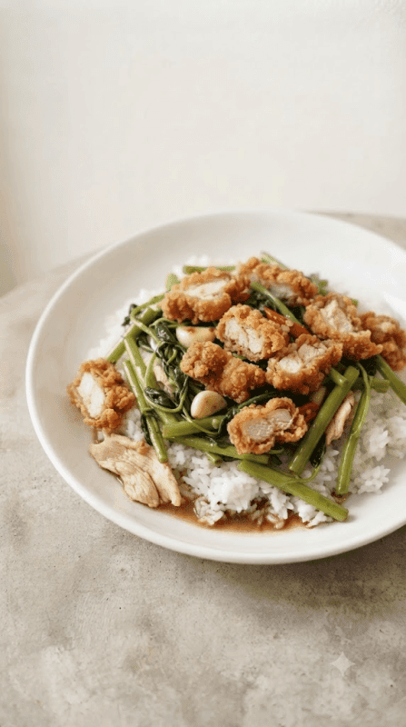Stir-fried Morning Glory over Rice with Crispy Chicken